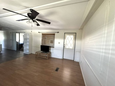 Here's a little slice a peace and happiness! Located on a on Golden Lakes Golf Course in Florida - for sale on GolfHomes.com, golf home, golf lot