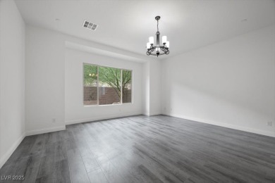 Experience upscale desert living in this stunning single-story on South Shore At Lake Las Vegas in Nevada - for sale on GolfHomes.com, golf home, golf lot