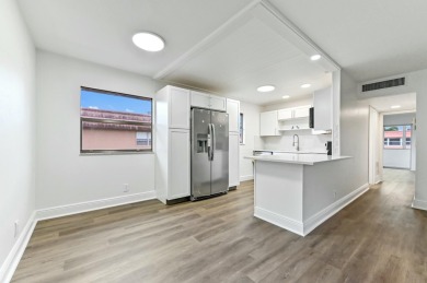 Come visit this beautifully renovated,modern and turn-key condo on Addison Reserve in Florida - for sale on GolfHomes.com, golf home, golf lot
