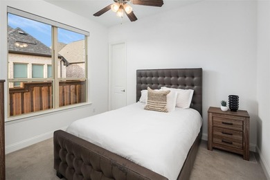 Experience elevated living with picturesque lake views from on The Tribute At the Colony in Texas - for sale on GolfHomes.com, golf home, golf lot