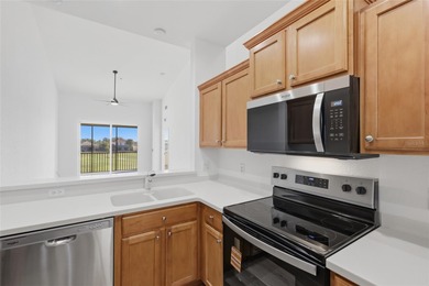 This move-in ready, second-floor 2-bedroom, 2-bath condo offers on Stoneybrook Golf Club At Heritage Harbour in Florida - for sale on GolfHomes.com, golf home, golf lot