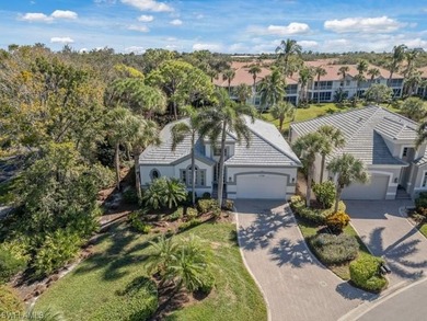 Set on a desirable corner lot with serene water and lush on Bonita Bay West in Florida - for sale on GolfHomes.com, golf home, golf lot