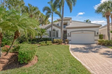 Set on a desirable corner lot with serene water and lush on Bonita Bay West in Florida - for sale on GolfHomes.com, golf home, golf lot