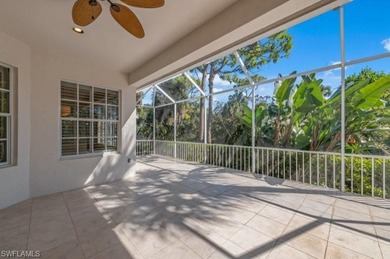Set on a desirable corner lot with serene water and lush on Bonita Bay West in Florida - for sale on GolfHomes.com, golf home, golf lot
