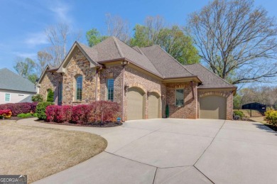 Welcome to refined elegance in this 5 BR/5 BA home on the 10th on Traditions of Braselton Golf Club in Georgia - for sale on GolfHomes.com, golf home, golf lot