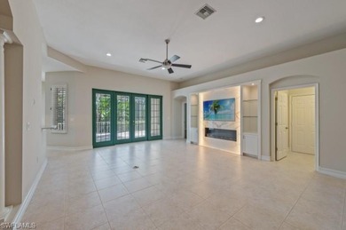 Set on a desirable corner lot with serene water and lush on Bonita Bay West in Florida - for sale on GolfHomes.com, golf home, golf lot