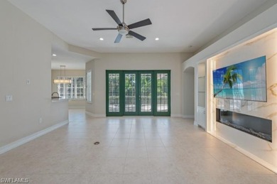 Set on a desirable corner lot with serene water and lush on Bonita Bay West in Florida - for sale on GolfHomes.com, golf home, golf lot