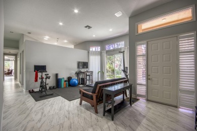 Located on a quiet cul-de-sac, this beautifully maintained home on Ibis Golf and Country Club in Florida - for sale on GolfHomes.com, golf home, golf lot