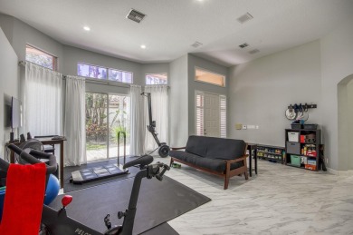Located on a quiet cul-de-sac, this beautifully maintained home on Ibis Golf and Country Club in Florida - for sale on GolfHomes.com, golf home, golf lot