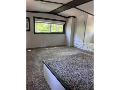 Have you been dreaming having your own permanent campsite?  Look on Voyager Village Country Club - Voyager in Wisconsin - for sale on GolfHomes.com, golf home, golf lot