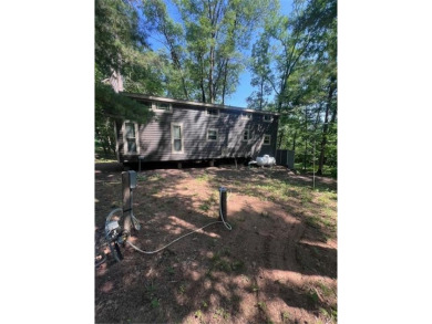 Have you been dreaming having your own permanent campsite?  Look on Voyager Village Country Club - Voyager in Wisconsin - for sale on GolfHomes.com, golf home, golf lot