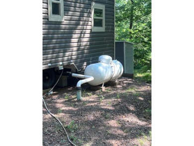 Have you been dreaming having your own permanent campsite?  Look on Voyager Village Country Club - Voyager in Wisconsin - for sale on GolfHomes.com, golf home, golf lot