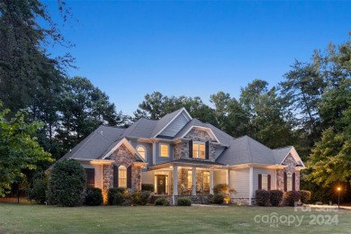 Located on a picturesque, park-like lot, this beautiful custom on Westport Golf Club in North Carolina - for sale on GolfHomes.com, golf home, golf lot