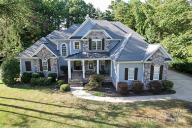 Located on a picturesque, park-like lot, this beautiful custom on Westport Golf Club in North Carolina - for sale on GolfHomes.com, golf home, golf lot