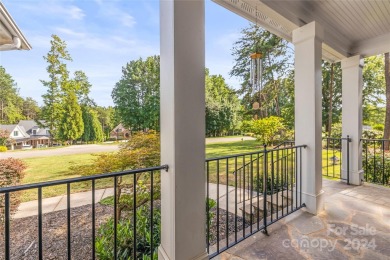 Located on a picturesque, park-like lot, this beautiful custom on Westport Golf Club in North Carolina - for sale on GolfHomes.com, golf home, golf lot