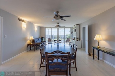 This spacious 1500 square foot corner unit is the one you have on Palm-Aire Country Club and Resort - Palms in Florida - for sale on GolfHomes.com, golf home, golf lot