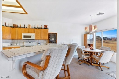 Located on the golf course, boasting breathtaking views of the on Mojave Resort Golf Club in Nevada - for sale on GolfHomes.com, golf home, golf lot