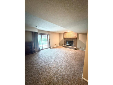 Welcome to this charming split-level home, perfectly suited for on The Deuce At the National Golf Club of Kansas City in Missouri - for sale on GolfHomes.com, golf home, golf lot