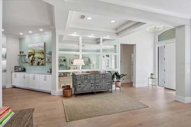 Welcome to an exceptional residence in the heart of University on University Park Country Club in Florida - for sale on GolfHomes.com, golf home, golf lot