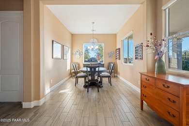 Set in the desirable Quailwood community, this impressive home on Quail Wood Greens Golf Course in Arizona - for sale on GolfHomes.com, golf home, golf lot