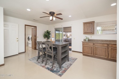 IMPRESSIVE EXPANDED WOODBURY, SITUATED ON A 8700 SQ. FT. N/S LOT on Union Hills Country Club in Arizona - for sale on GolfHomes.com, golf home, golf lot