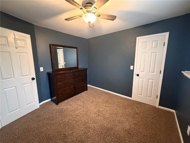 Welcome to this charming split-level home, perfectly suited for on The Deuce At the National Golf Club of Kansas City in Missouri - for sale on GolfHomes.com, golf home, golf lot