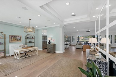 Welcome to an exceptional residence in the heart of University on University Park Country Club in Florida - for sale on GolfHomes.com, golf home, golf lot