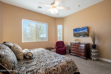 Set in the desirable Quailwood community, this impressive home on Quail Wood Greens Golf Course in Arizona - for sale on GolfHomes.com, golf home, golf lot