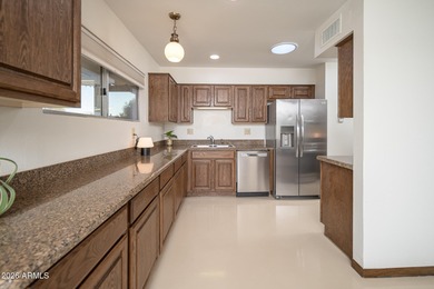 IMPRESSIVE EXPANDED WOODBURY, SITUATED ON A 8700 SQ. FT. N/S LOT on Union Hills Country Club in Arizona - for sale on GolfHomes.com, golf home, golf lot