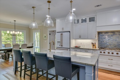 SOME PEOPLE DO EVERYTHING RIGHT! This LAKE FRONT home was CUSTOM on Monticello Golf Club At Savannah Lakes in South Carolina - for sale on GolfHomes.com, golf home, golf lot