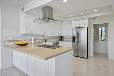 Enjoy carefree luxury living at Rancho Mirage's only high-rise on Desert Island Golf and Country Club in California - for sale on GolfHomes.com, golf home, golf lot