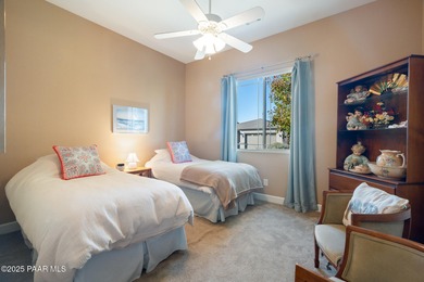 Set in the desirable Quailwood community, this impressive home on Quail Wood Greens Golf Course in Arizona - for sale on GolfHomes.com, golf home, golf lot