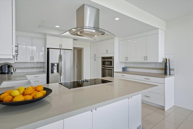 Enjoy carefree luxury living at Rancho Mirage's only high-rise on Desert Island Golf and Country Club in California - for sale on GolfHomes.com, golf home, golf lot