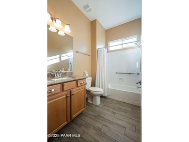 Set in the desirable Quailwood community, this impressive home on Quail Wood Greens Golf Course in Arizona - for sale on GolfHomes.com, golf home, golf lot