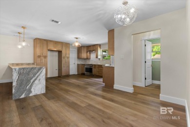 Gorgeous, reimagined home on a beautiful cul-de-sac with the on Lake Forest Yacht and Country Club in Alabama - for sale on GolfHomes.com, golf home, golf lot