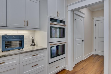 SOME PEOPLE DO EVERYTHING RIGHT! This LAKE FRONT home was CUSTOM on Monticello Golf Club At Savannah Lakes in South Carolina - for sale on GolfHomes.com, golf home, golf lot