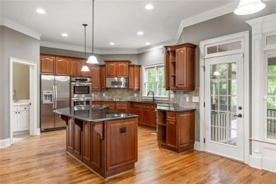 Welcome to an oasis of luxury situated on Mirror Lakes on Mirror Lake Golf Club in Georgia - for sale on GolfHomes.com, golf home, golf lot