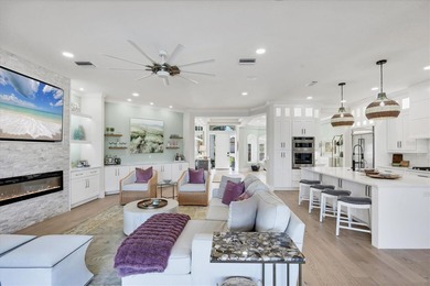 Welcome to an exceptional residence in the heart of University on University Park Country Club in Florida - for sale on GolfHomes.com, golf home, golf lot