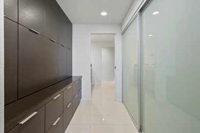 Enjoy carefree luxury living at Rancho Mirage's only high-rise on Desert Island Golf and Country Club in California - for sale on GolfHomes.com, golf home, golf lot