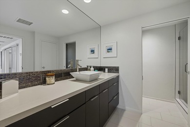 Enjoy carefree luxury living at Rancho Mirage's only high-rise on Desert Island Golf and Country Club in California - for sale on GolfHomes.com, golf home, golf lot