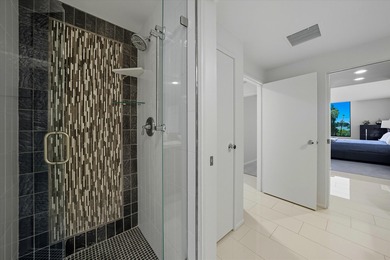 Enjoy carefree luxury living at Rancho Mirage's only high-rise on Desert Island Golf and Country Club in California - for sale on GolfHomes.com, golf home, golf lot