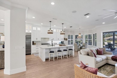 Welcome to an exceptional residence in the heart of University on University Park Country Club in Florida - for sale on GolfHomes.com, golf home, golf lot