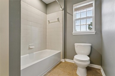 This beautifully maintained home features brand new carpet and on The Tradition Golf Club At Royal New Kent in Virginia - for sale on GolfHomes.com, golf home, golf lot