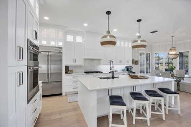 Welcome to an exceptional residence in the heart of University on University Park Country Club in Florida - for sale on GolfHomes.com, golf home, golf lot