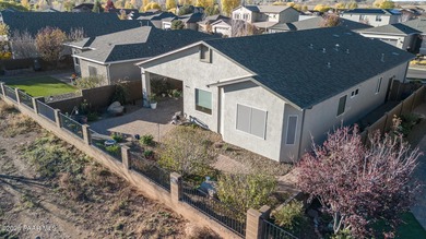 Set in the desirable Quailwood community, this impressive home on Quail Wood Greens Golf Course in Arizona - for sale on GolfHomes.com, golf home, golf lot