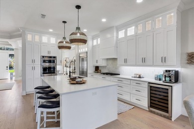 Welcome to an exceptional residence in the heart of University on University Park Country Club in Florida - for sale on GolfHomes.com, golf home, golf lot