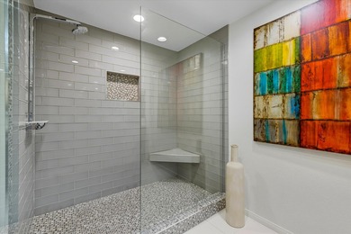 Enjoy carefree luxury living at Rancho Mirage's only high-rise on Desert Island Golf and Country Club in California - for sale on GolfHomes.com, golf home, golf lot