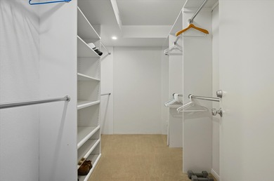 Enjoy carefree luxury living at Rancho Mirage's only high-rise on Desert Island Golf and Country Club in California - for sale on GolfHomes.com, golf home, golf lot