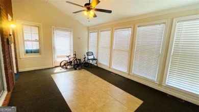 Welcome home to this charming & spacious four-sided brick home on Southland Country Club in Georgia - for sale on GolfHomes.com, golf home, golf lot