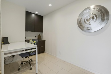 Enjoy carefree luxury living at Rancho Mirage's only high-rise on Desert Island Golf and Country Club in California - for sale on GolfHomes.com, golf home, golf lot